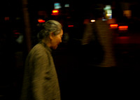 Old woman going home in Hanoi