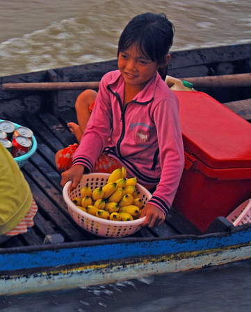Fruit seller on Tonle Sap Lake, Cambodia