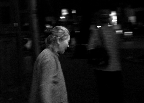 Woman going home at night, Hanoi
