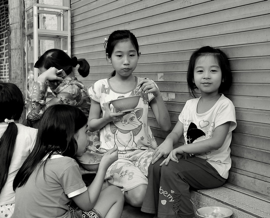 Young kids having breakfast, Hanoi, Vietnam