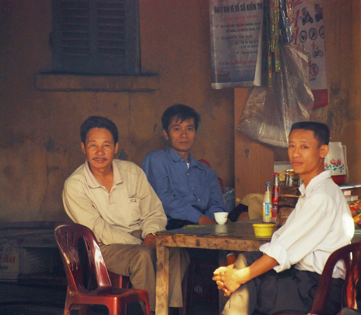Three men at breakfast, Hanoi, Vietnam