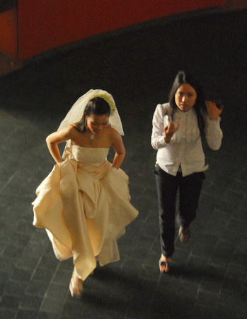 Bride and friend arriving for wedding photo session