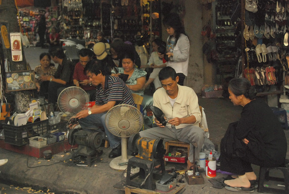 Street shoe repairers, Hanoi
