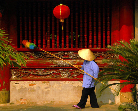 Dusting the windows at the Temple of Literature, Hanoi