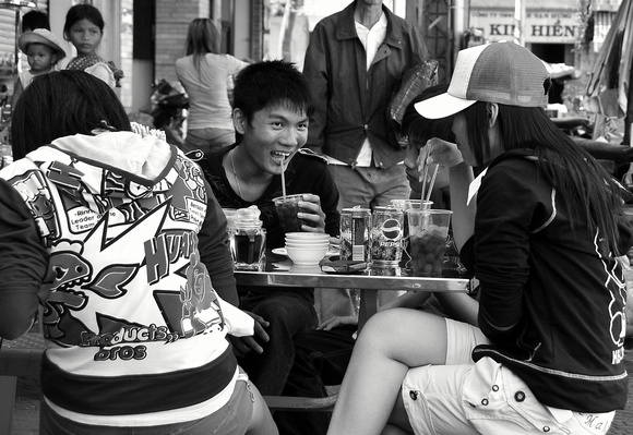 Flirting over iced coffee, Saigon, Vietnam