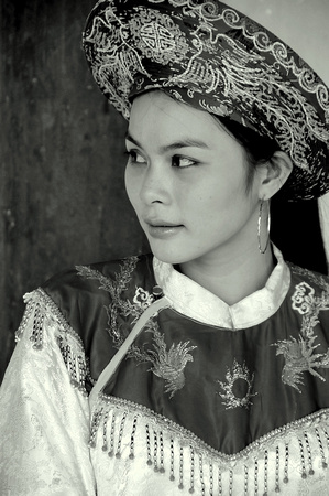 Woman in traditional dress, Hue, Vietnam