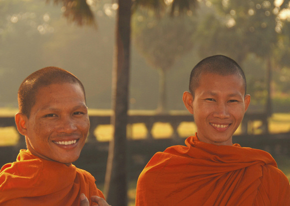 Two monks visiting Angkor Wat, Cambodia