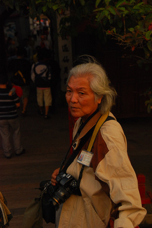 Street portrait photographer, Hanoi